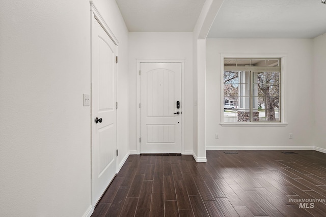 1452 E Pistioa, Meridian, ID 83642 - foyer entrance featuring baseboards, dark wood finished floors, and visible vents