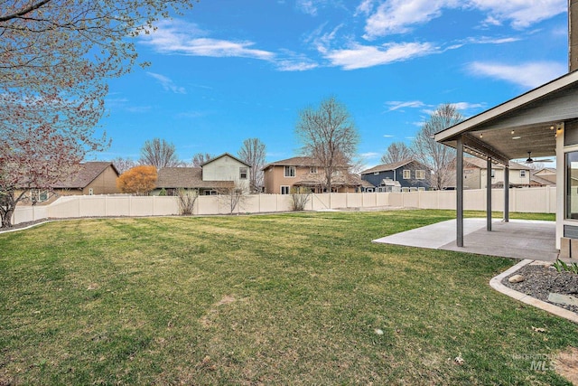 1452 E Pistioa, Meridian, ID 83642 - view of yard featuring a patio, ceiling fan, fence, and a residential view