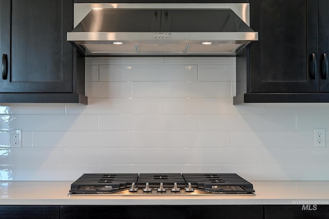 8709 W Pickett Creek St, Star, ID 83669 - kitchen with ventilation hood, light countertops, and backsplash