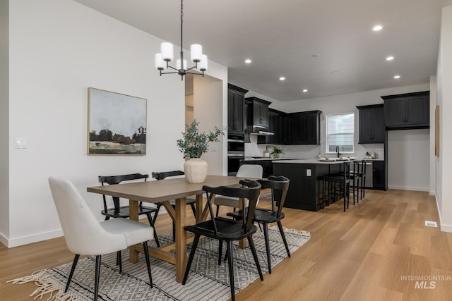 8709 W Pickett Creek St, Star, ID 83669 - dining area with a chandelier, light wood-style flooring, and recessed lighting