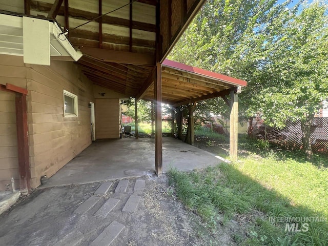 view of patio / terrace featuring a carport