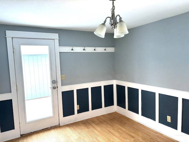 616 E 8th, Moscow, ID 83843 - entryway with a chandelier, wainscoting, and wood finished floors