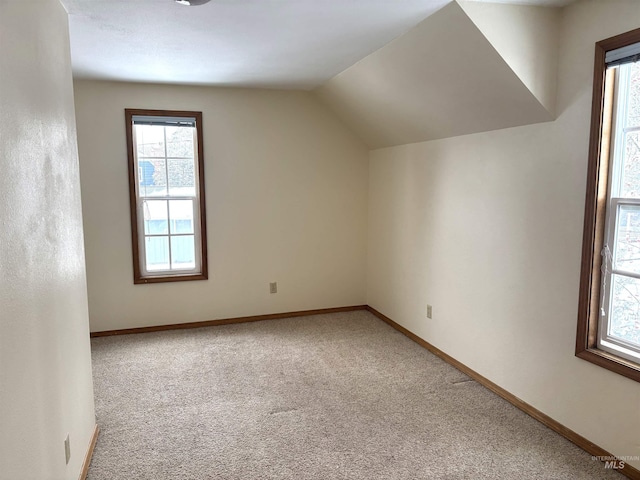 616 E 8th, Moscow, ID 83843 - bonus room featuring carpet, vaulted ceiling, and baseboards