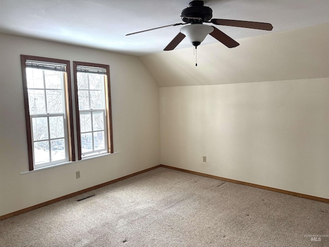 616 E 8th, Moscow, ID 83843 - bonus room featuring lofted ceiling, light carpet, ceiling fan, and baseboards