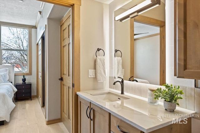 79 E Aikens Rd, Apt Eagle, ID 83616 - ensuite bathroom with vanity and baseboards