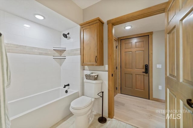 79 E Aikens Rd, Apt Eagle, ID 83616 - bathroom featuring bathing tub / shower combination, wood finished floors, and recessed lighting