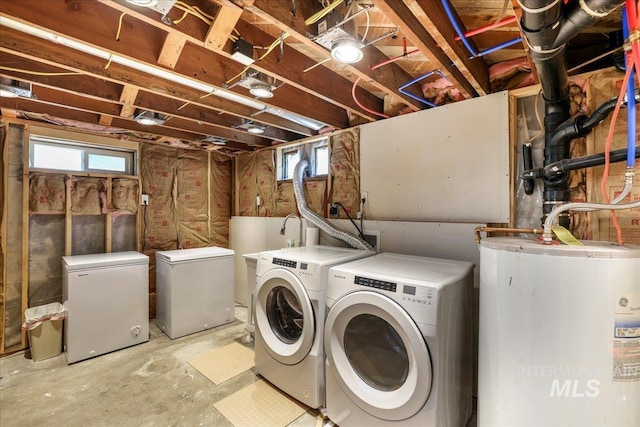 313NORTH Birch St, Shoshone, ID 83352 - washroom with gas water heater, separate washer and dryer, and plenty of natural light
