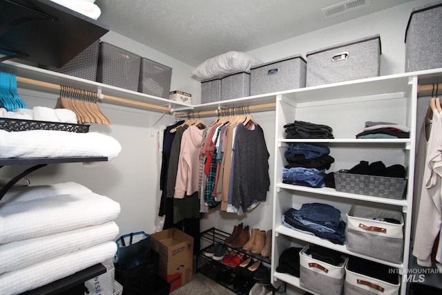 walk in closet featuring visible vents