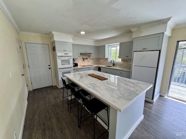 250 Hill Rd, Orofino, ID 83543 - kitchen with a sink, gray cabinets, dark wood-style flooring, and white appliances
