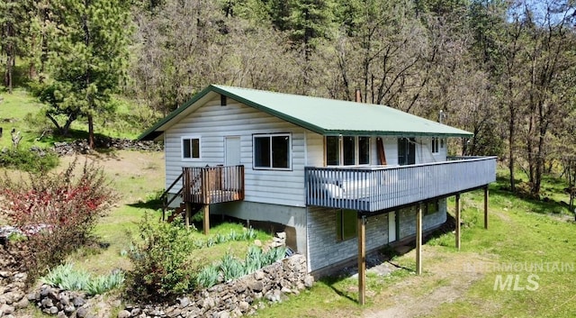 250 Hill Rd, Orofino, ID 83543 - rear view of property featuring a wooden deck and a forest view