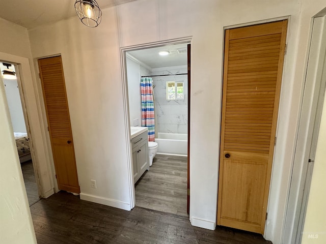 250 Hill Rd, Orofino, ID 83543 - hallway featuring dark wood-style floors, baseboards, and crown molding