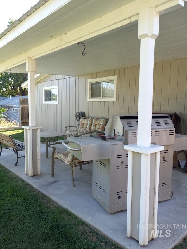 view of patio / terrace with fence