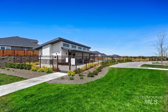 exterior space featuring a fenced front yard