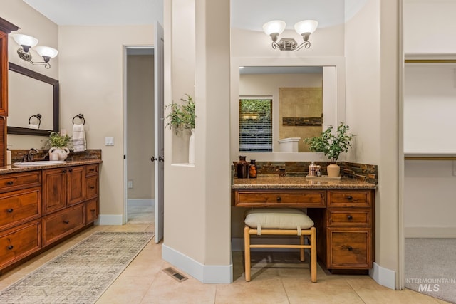 731 E Eaglewoods Ln, Eagle, ID 83616 - full bathroom with vanity, a walk in closet, and tile patterned floors