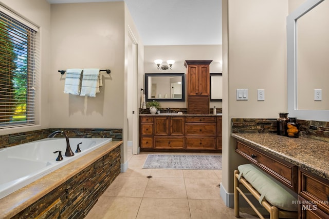 731 E Eaglewoods Ln, Eagle, ID 83616 - bathroom featuring a bath, vanity, tile patterned floors, and healthy amount of natural light