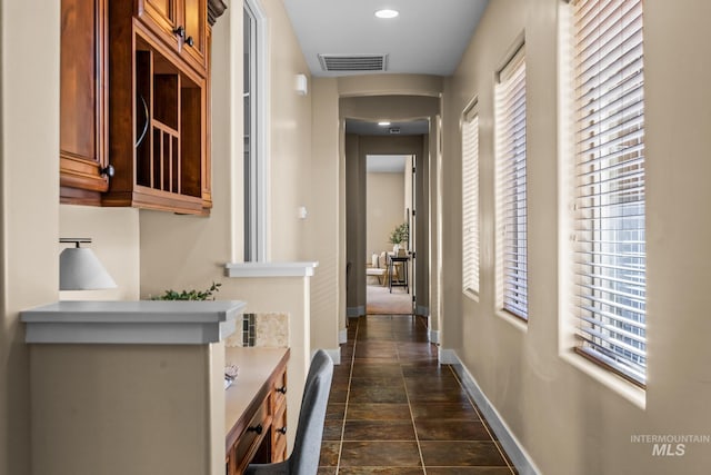 731 E Eaglewoods Ln, Eagle, ID 83616 - hallway featuring plenty of natural light and recessed lighting
