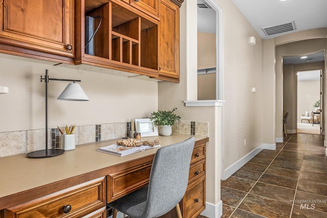 731 E Eaglewoods Ln, Eagle, ID 83616 - office space featuring dark stone finish flooring and built in desk