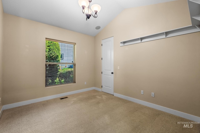 731 E Eaglewoods Ln, Eagle, ID 83616 - carpeted spare room with vaulted ceiling and baseboards