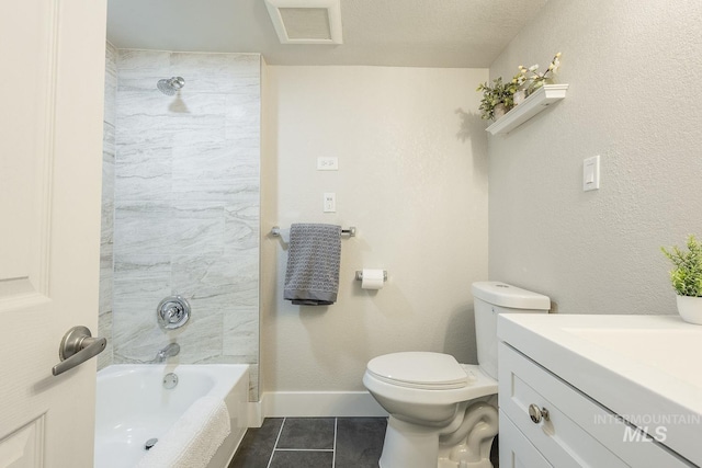 full bathroom featuring vanity, baseboards, visible vents, tile patterned floors, and toilet