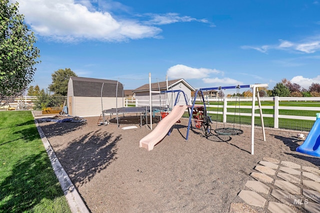 view of play area with a yard