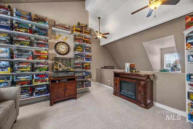 recreation room featuring ceiling fan, baseboards, and carpet