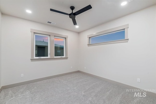 3359 E Warm Springs Ave, Boise, ID 83716 - empty room with a ceiling fan, carpet floors, and recessed lighting