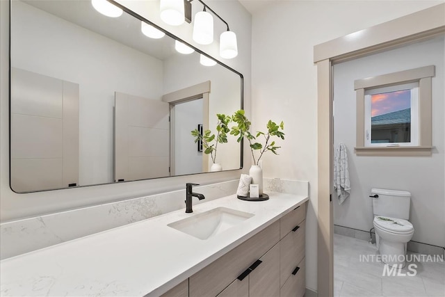 3359 E Warm Springs Ave, Boise, ID 83716 - bathroom with toilet and vanity