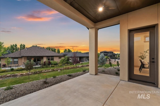 3359 E Warm Springs Ave, Boise, ID 83716 - patio terrace at dusk with a patio