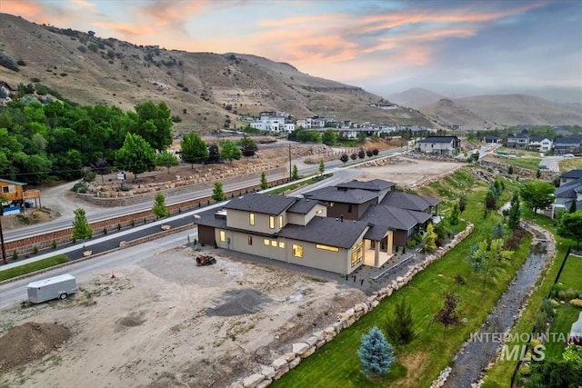 3359 E Warm Springs Ave, Boise, ID 83716 - aerial view at dusk of a mountain view