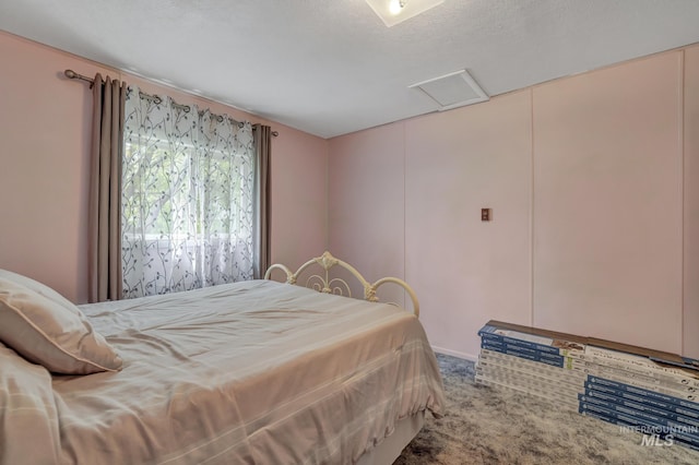 420 E 3rd St, Shoshone, ID 83352 - carpeted bedroom featuring attic access
