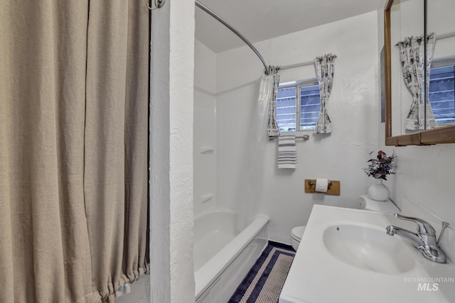420 E 3rd St, Shoshone, ID 83352 - full bathroom with shower / bath combo with shower curtain, toilet, and vanity