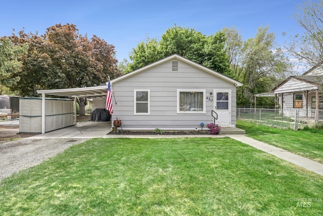 420 E 3rd St, Shoshone, ID 83352 - view of front of home featuring driveway and an attached carport