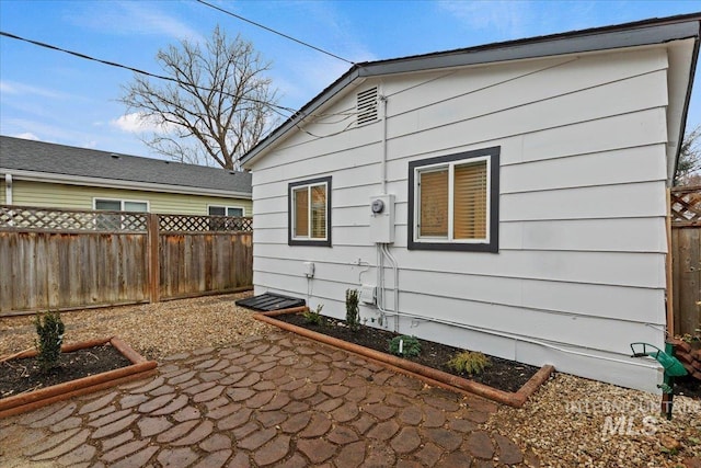 view of home's exterior with a patio area