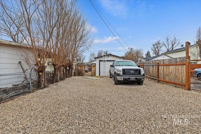 view of yard with a garage