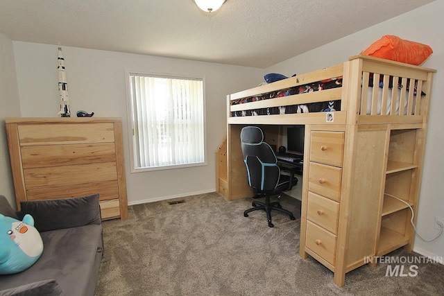 bedroom featuring baseboards, carpet, and visible vents