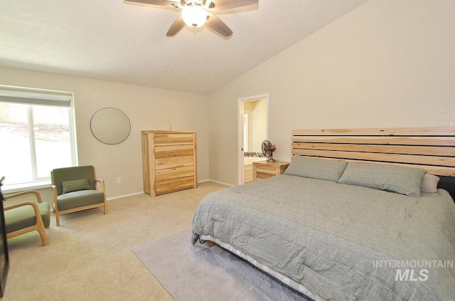 bedroom featuring baseboards, ceiling fan, vaulted ceiling, and light colored carpet