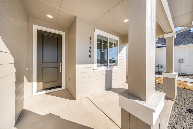 entrance to property with covered porch