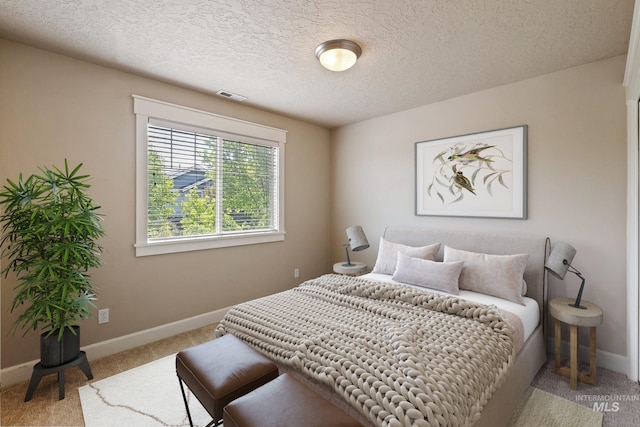 3993 N Heritage View Ave, Meridian, ID 83646 - carpeted bedroom featuring baseboards and a textured ceiling