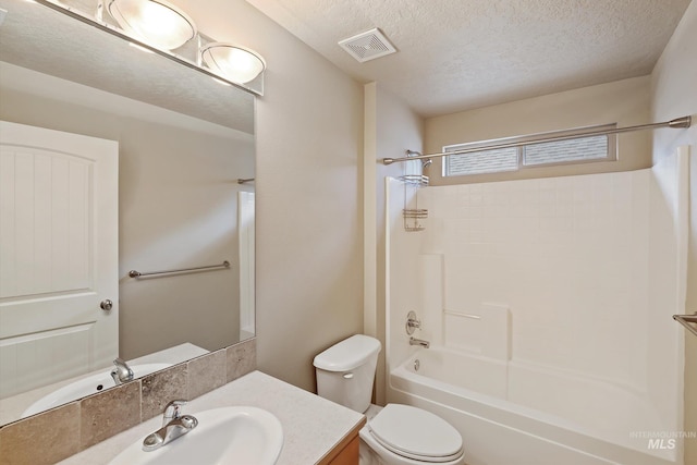 3993 N Heritage View Ave, Meridian, ID 83646 - full bathroom with toilet, vanity,  shower combination, and a textured ceiling