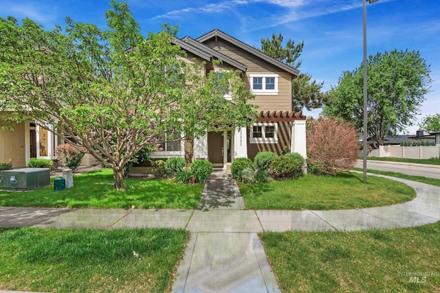 3993 N Heritage View Ave, Meridian, ID 83646 - view of front of property with a pergola and a front lawn
