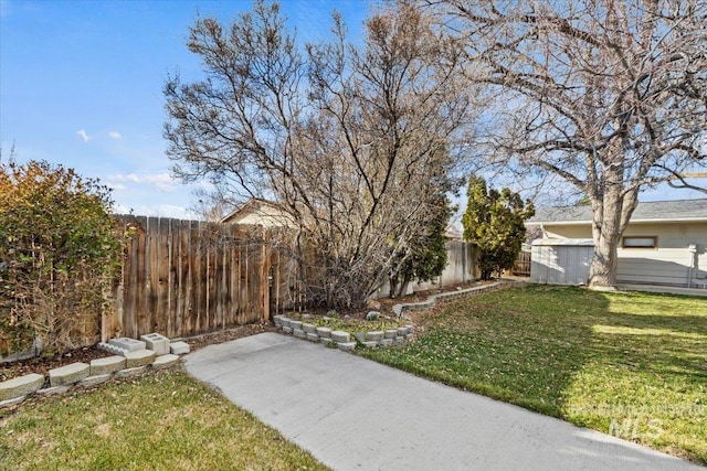 view of yard featuring a fenced backyard and a patio area