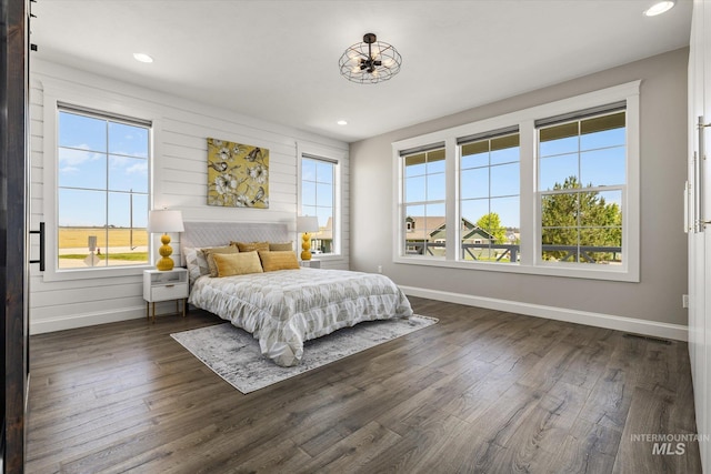 12975 Silversage Dr, Nampa, ID 83686 - bedroom with dark wood finished floors and recessed lighting