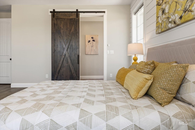 12975 Silversage Dr, Nampa, ID 83686 - bedroom with a barn door and baseboards