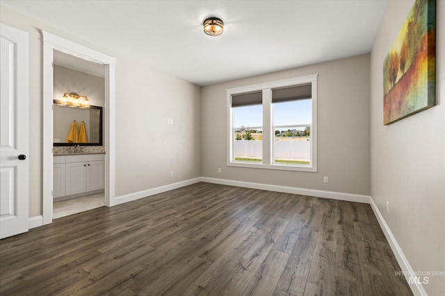 12975 Silversage Dr, Nampa, ID 83686 - spare room featuring dark wood-style flooring
