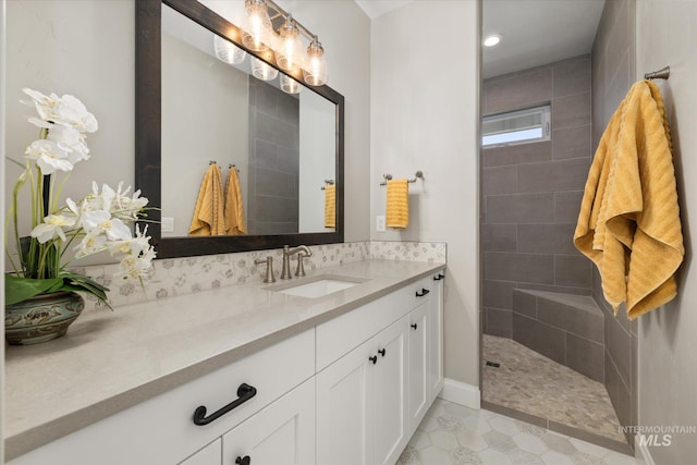 12975 Silversage Dr, Nampa, ID 83686 - bathroom featuring vanity, a walk in shower, recessed lighting, and tile patterned floors