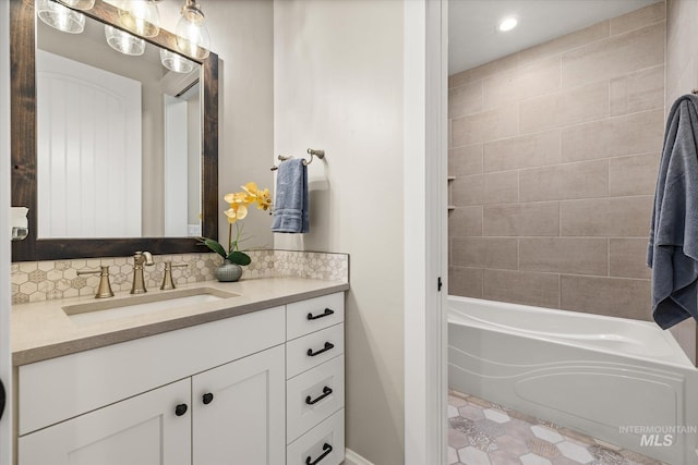 12975 Silversage Dr, Nampa, ID 83686 - bathroom featuring vanity, shower / bath combination, and recessed lighting