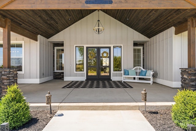 12975 Silversage Dr, Nampa, ID 83686 - entrance to property featuring french doors, board and batten siding, and a patio area