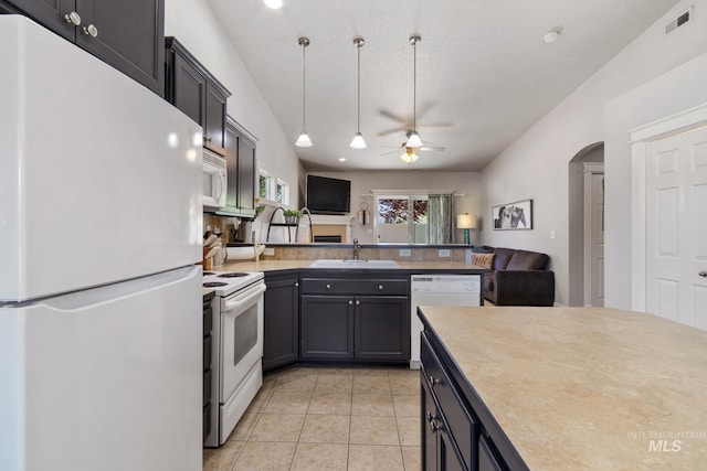 1326 N Alvey, Meridian, ID 83642 - kitchen featuring white appliances, a sink, open floor plan, a ceiling fan, and light countertops