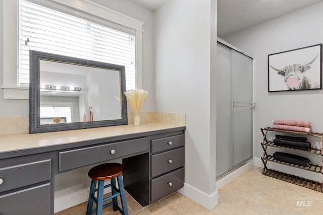1326 N Alvey, Meridian, ID 83642 - bathroom featuring a stall shower, tile patterned floors, vanity, and healthy amount of natural light