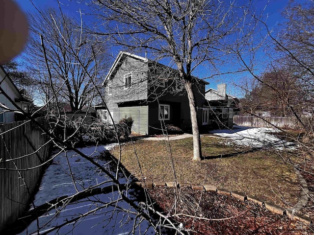 view of home's exterior with a fenced backyard